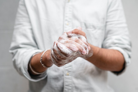 Parent and child washing hands - hand hygiene helps stop threadworms (pinworms) spreading in children